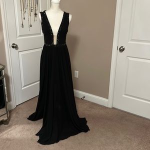 A long evening gown with black beading